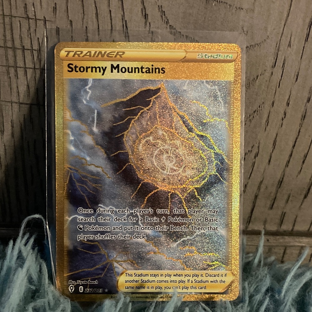 Ultra rare Stormy Mountains Trainer Card